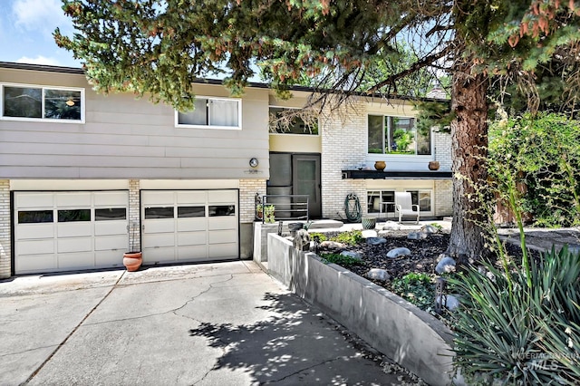 raised ranch featuring a garage