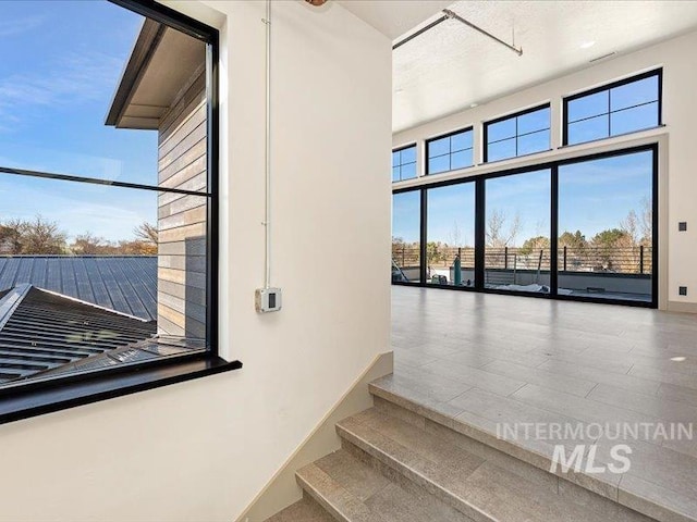 stairway featuring wood finished floors