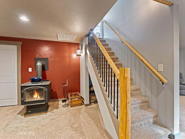 stairs with a wood stove