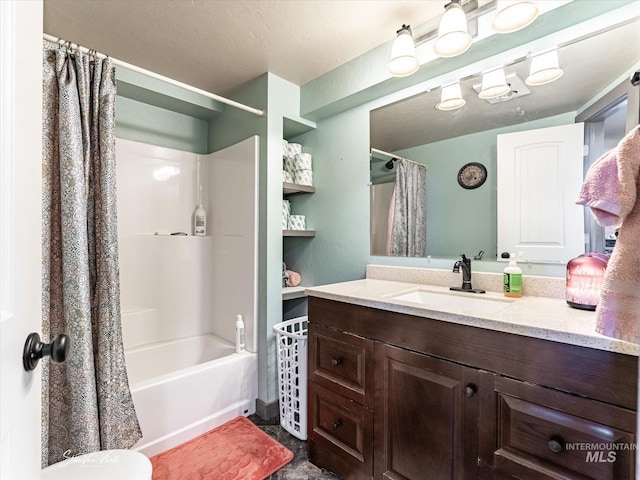 full bathroom with shower / bath combo, vanity, and toilet