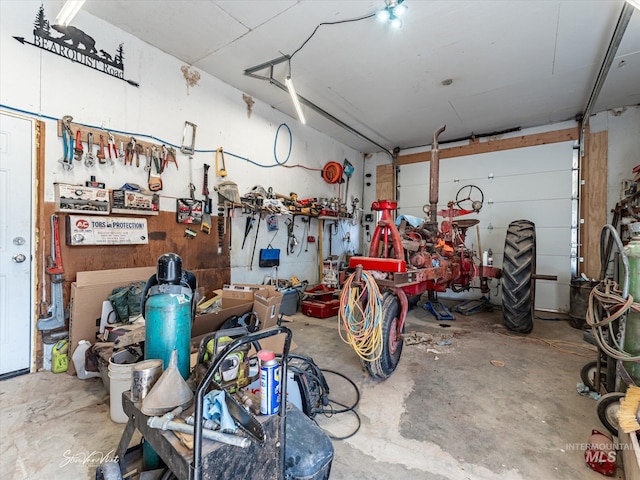 garage with a workshop area