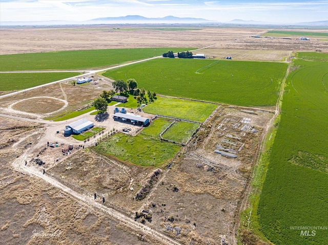 bird's eye view featuring a mountain view and a rural view