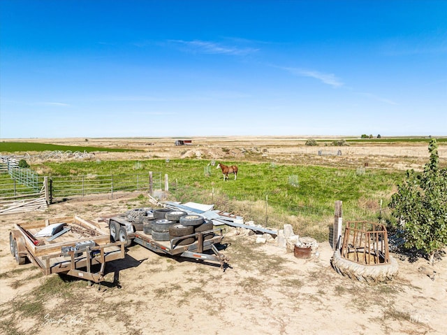 view of yard with a rural view