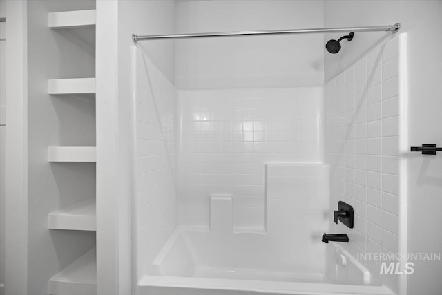bathroom featuring washtub / shower combination