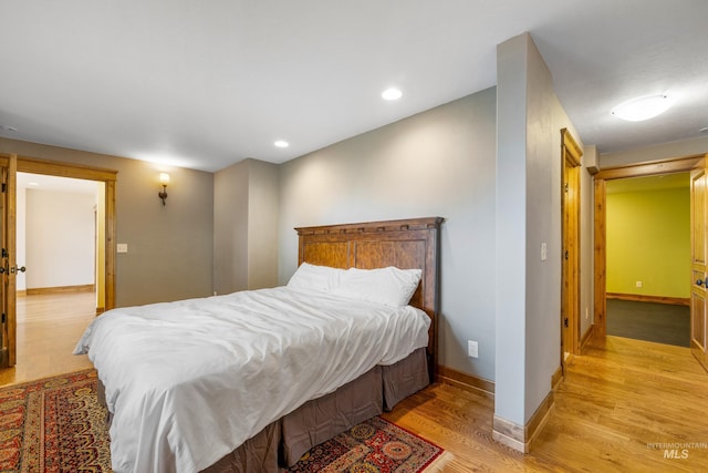 bedroom featuring light hardwood / wood-style flooring