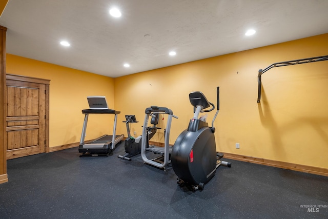 workout room featuring carpet flooring