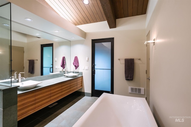 1115 Heavens Gate Ct, Mccall, ID 83638 - bathroom with tile patterned floors, double vanity, recessed lighting, beamed ceiling, and wood ceiling