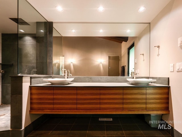 1115 Heavens Gate Ct, Mccall, ID 83638 - full bathroom with double vanity, tile patterned flooring, recessed lighting, tiled shower, and lofted ceiling