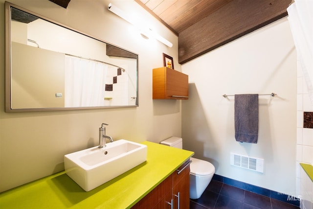 1115 Heavens Gate Ct, Mccall, ID 83638 - bathroom with wooden ceiling, toilet, tile patterned floors, a shower with shower curtain, and vanity