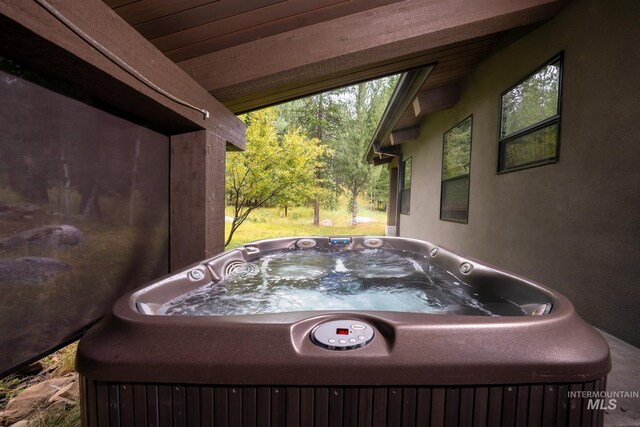 1115 Heavens Gate Ct, Mccall, ID 83638 - exterior view of a hot tub and stucco siding