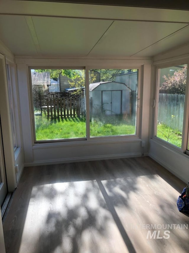 3109 N Tamarack Dr, Boise, ID 83703 - unfurnished sunroom featuring wood finished floors and baseboards