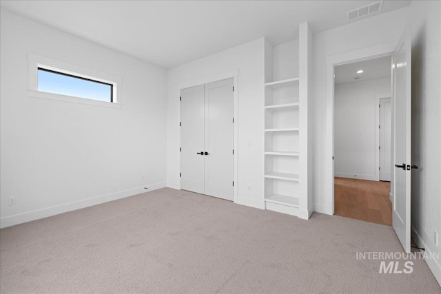 13625 Hickory Rnch, Nampa, ID 83651 - unfurnished bedroom featuring carpet flooring, baseboards, and a closet