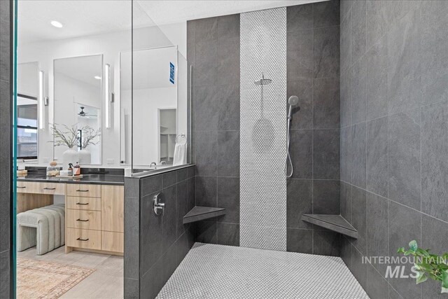 13625 Hickory Rnch, Nampa, ID 83651 - bathroom featuring a walk in shower, vanity, tile patterned flooring, and recessed lighting
