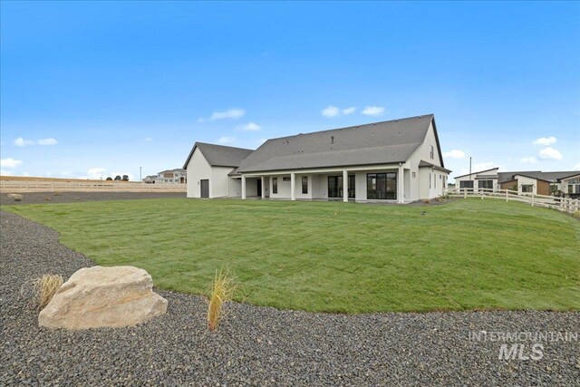13625 Hickory Rnch, Nampa, ID 83651 - rear view of house featuring roof with shingles