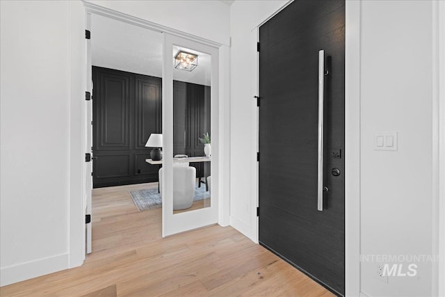 13625 Hickory Rnch, Nampa, ID 83651 - foyer with light wood-style floors and baseboards