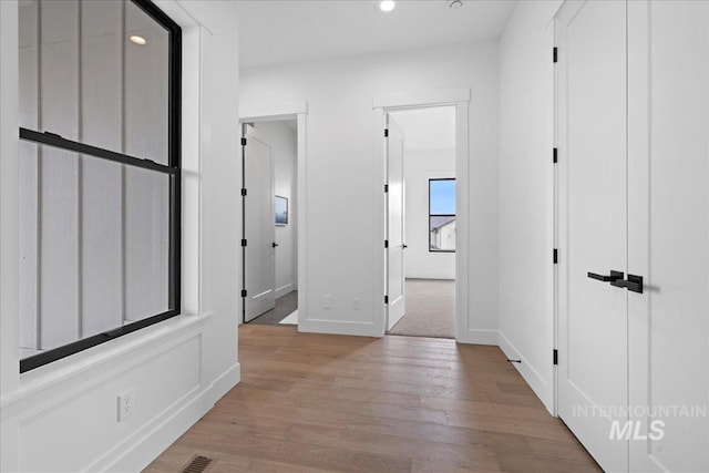 13625 Hickory Rnch, Nampa, ID 83651 - hallway with light wood-style floors, baseboards, and recessed lighting