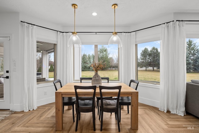 3031 Champagne Ct, Eagle, ID 83616 - dining space with a textured ceiling, plenty of natural light, baseboards, and recessed lighting