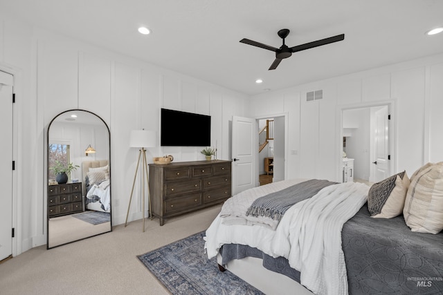 3031 Champagne Ct, Eagle, ID 83616 - bedroom with light carpet, visible vents, a decorative wall, and recessed lighting