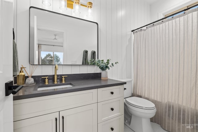 3031 Champagne Ct, Eagle, ID 83616 - bathroom with toilet, vanity, and a shower with curtain