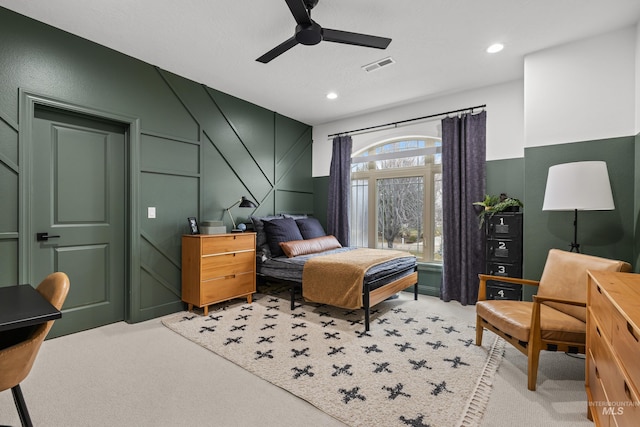 3031 Champagne Ct, Eagle, ID 83616 - bedroom with a ceiling fan, recessed lighting, visible vents, a decorative wall, and light carpet