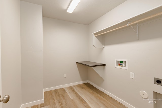 washroom with light wood-type flooring, electric dryer hookup, and washer hookup