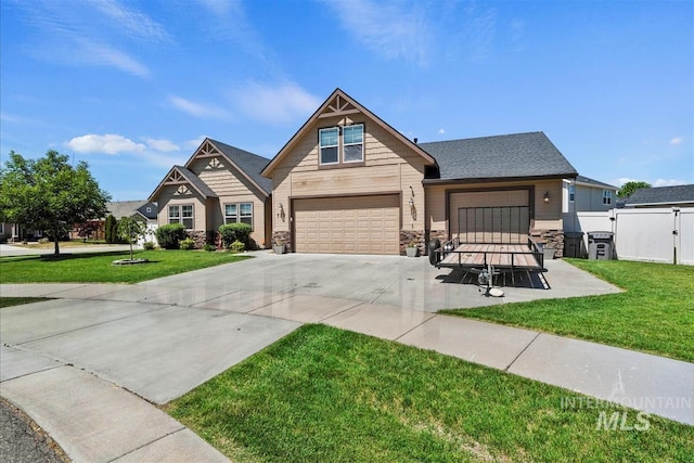 730 N Finsbury Way, Star, ID 83669 - craftsman inspired home with stone siding, concrete driveway, and an attached garage