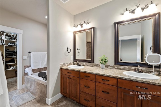 730 N Finsbury Way, Star, ID 83669 - bathroom featuring double vanity and a bath