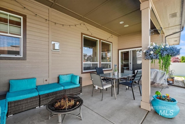 730 N Finsbury Way, Star, ID 83669 - view of patio / terrace with a fire pit and outdoor dining area
