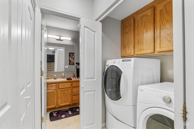 386 E Valleyview Ave, Genesee, ID 83832 - laundry area featuring washing machine and clothes dryer and cabinet space
