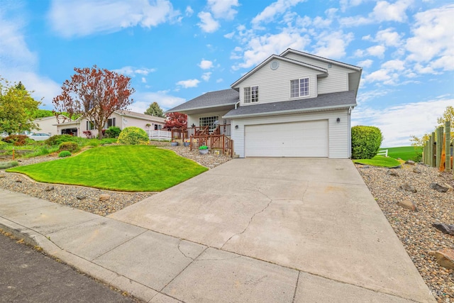 386 E Valleyview Ave, Genesee, ID 83832 - view of front of house with an attached garage, concrete driveway, and a porch