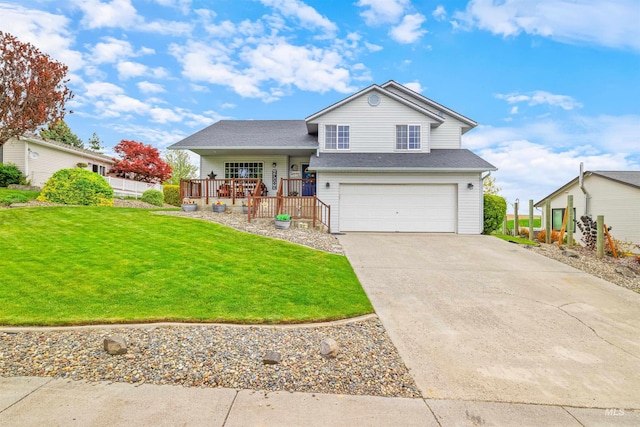 386 E Valleyview Ave, Genesee, ID 83832 - tri-level home with a garage, a front yard, concrete driveway, and covered porch