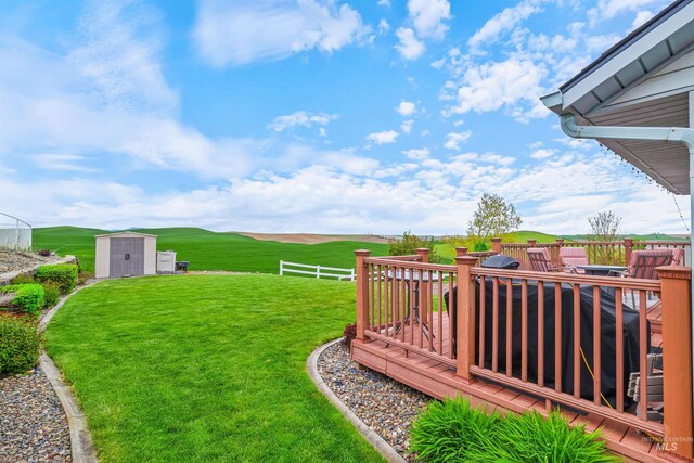 386 E Valleyview Ave, Genesee, ID 83832 - view of grassy yard featuring a wooden deck