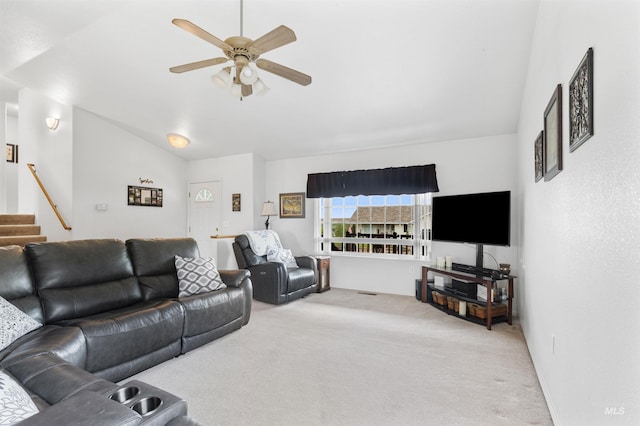 386 E Valleyview Ave, Genesee, ID 83832 - carpeted living room featuring vaulted ceiling, ceiling fan, and stairway