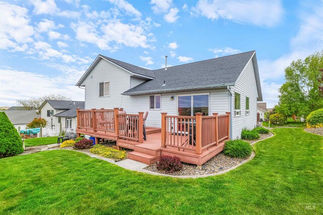 386 E Valleyview Ave, Genesee, ID 83832 - back of property with roof with shingles, a yard, and a deck