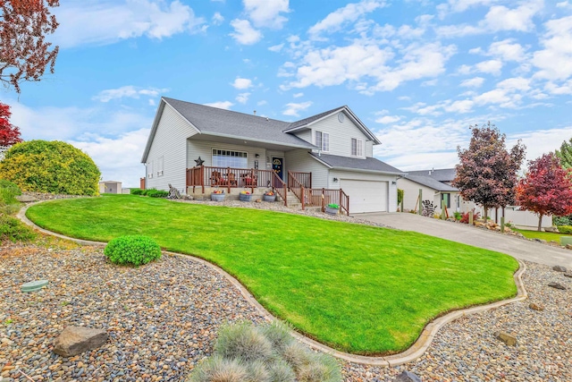 386 E Valleyview Ave, Genesee, ID 83832 - view of front of property featuring concrete driveway, a front lawn, a garage, covered porch, and roof with shingles