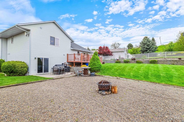 386 E Valleyview Ave, Genesee, ID 83832 - rear view of house with an outdoor fire pit, a patio area, and a wooden deck