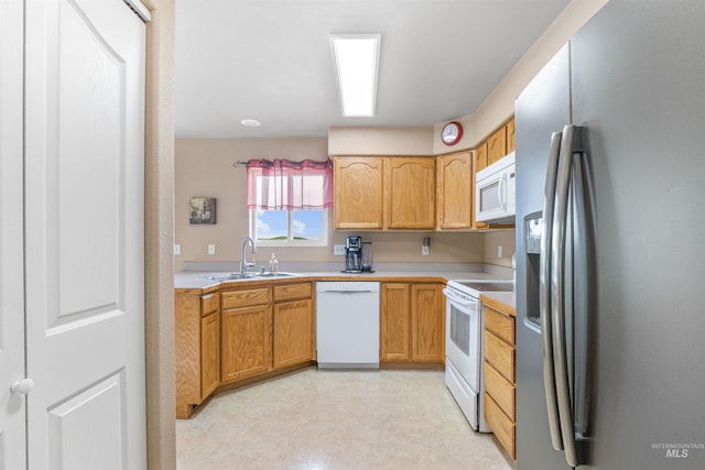 386 E Valleyview Ave, Genesee, ID 83832 - kitchen featuring white appliances, a sink, light countertops, and light flooring