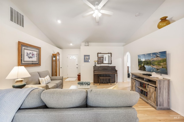 1177 N Lopez Ave, Eagle, ID 83616 - living area with lofted ceiling, arched walkways, a ceiling fan, light wood finished floors, and recessed lighting