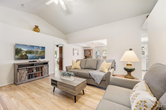 1177 N Lopez Ave, Eagle, ID 83616 - living room featuring ceiling fan, lofted ceiling, and light wood finished floors