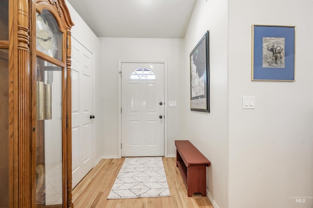 1177 N Lopez Ave, Eagle, ID 83616 - doorway with light wood finished floors and baseboards