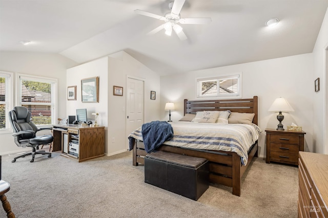 1177 N Lopez Ave, Eagle, ID 83616 - bedroom with light carpet, baseboards, vaulted ceiling, a desk, and a ceiling fan