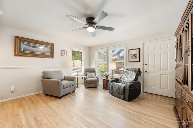 1177 N Lopez Ave, Eagle, ID 83616 - sitting room featuring ceiling fan, light wood-style floors, and baseboards