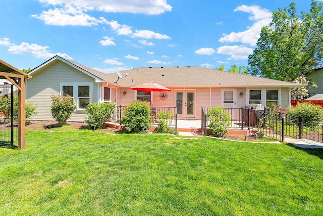 1177 N Lopez Ave, Eagle, ID 83616 - rear view of property with french doors, a patio, and a shingled roof