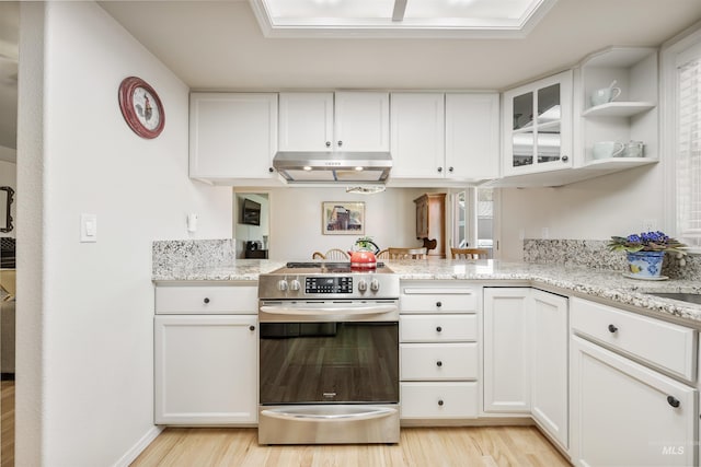 1177 N Lopez Ave, Eagle, ID 83616 - kitchen featuring stainless steel electric range, under cabinet range hood, light wood-style floors, white cabinetry, and light stone countertops