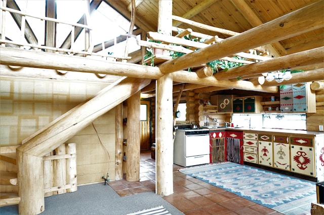 interior space with wood ceiling, lofted ceiling with beams, light tile floors, and range