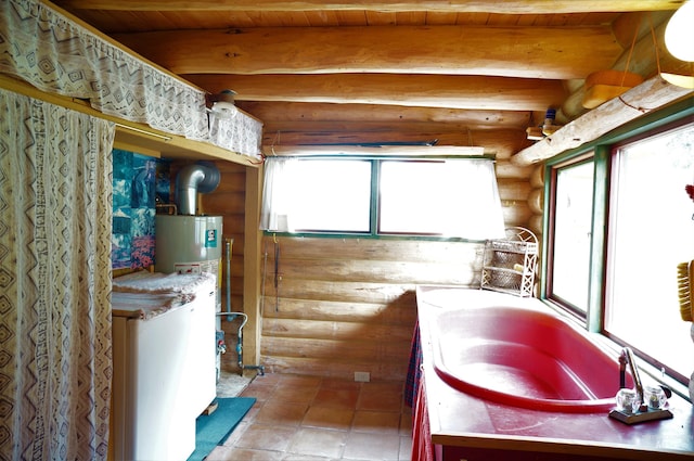 bathroom featuring log walls, beam ceiling, and tile floors