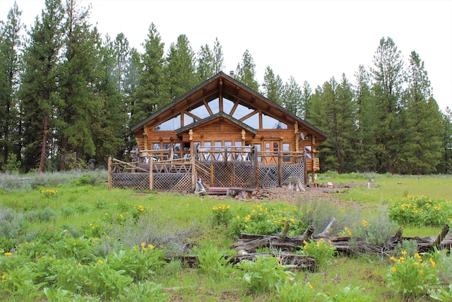 exterior space featuring a wooden deck