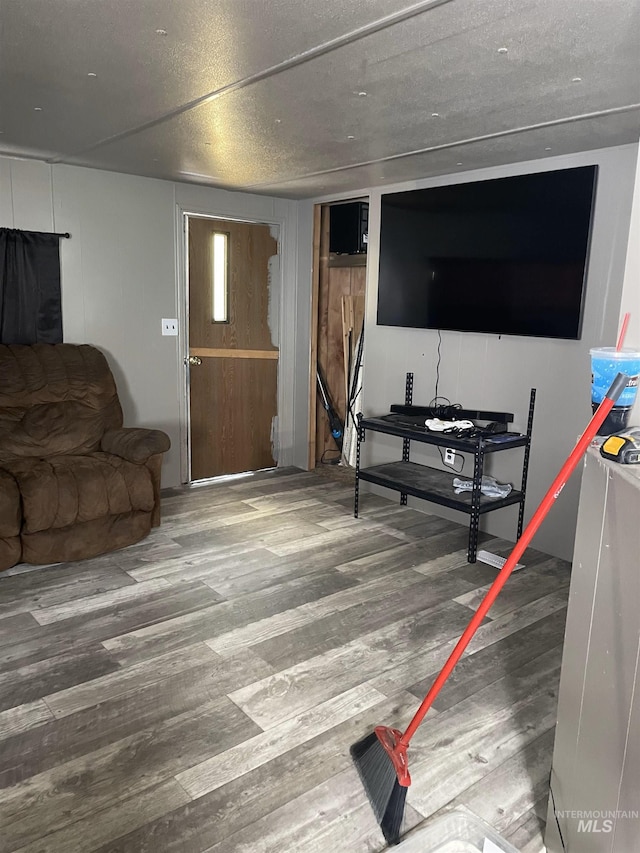 living area with wood finished floors