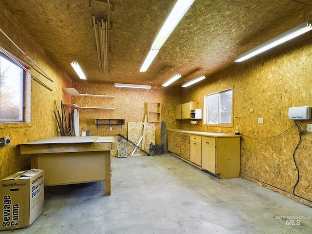 interior space featuring a workshop area