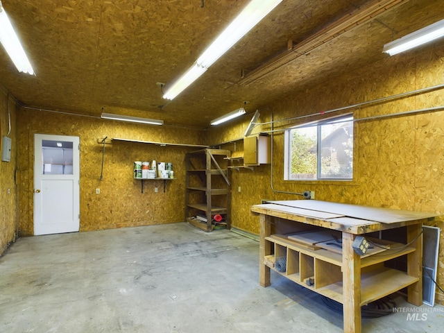 basement with a workshop area